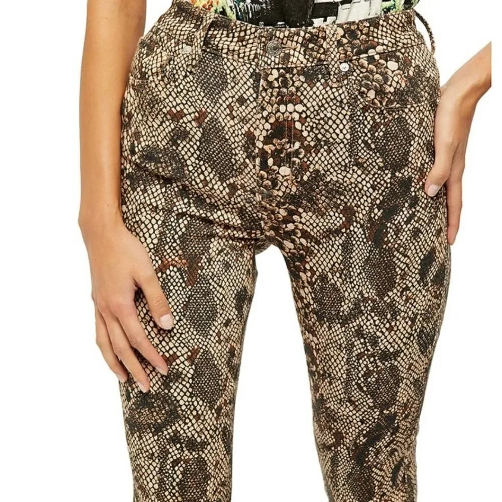 Free people raw high-rise snake print jeggings